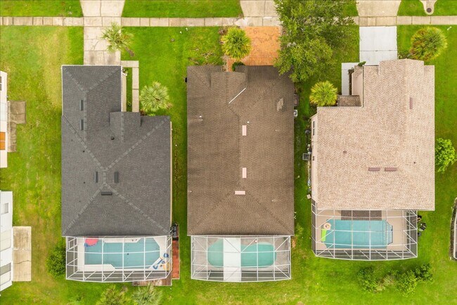 Building Photo - Stunning 4-Bedroom Lakefront Pool Home in Bridgeview at Meadow Woods