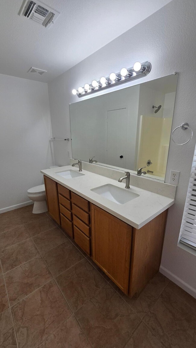 Building Photo - 15537 W Gelding Dr