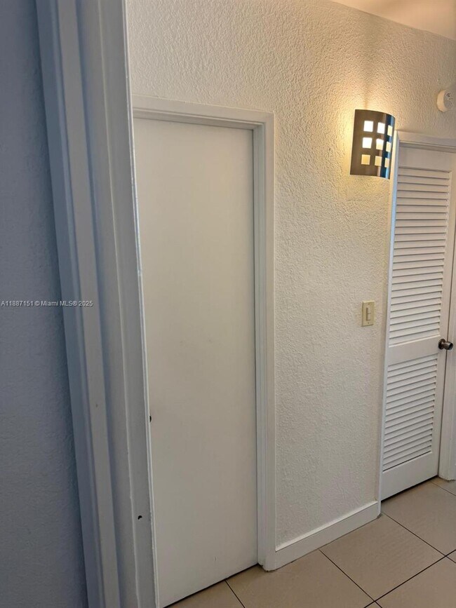 Building Photo - 19380 Collins Ave