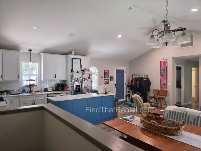 Building Photo - Available August 16! A pet friendly ranch with dishwasher, garage, basement, storage, yard, deck