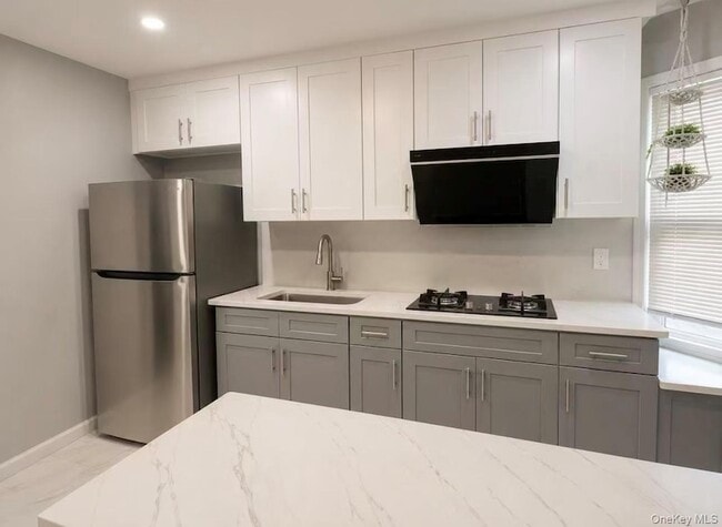 Building Photo - 8753 95th Street Unit 2F