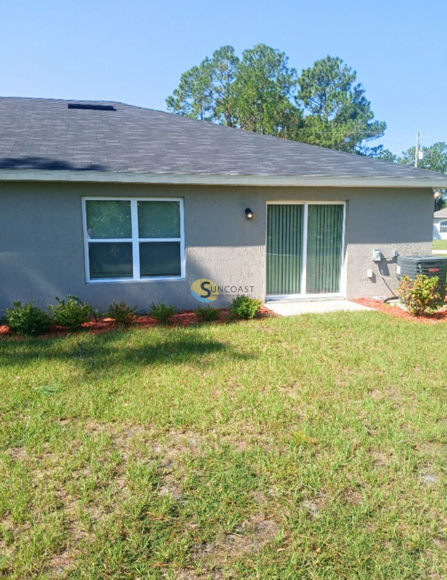 Building Photo - Low Price W/ Hot Special in Palm Coast!