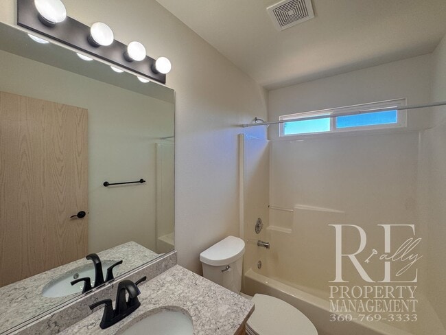 Building Photo - Immaculate Bremerton Home with Expansive Yard, Multiple Living Areas & Designer Kitchen