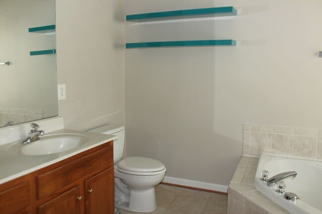 Building Photo - Beautiful 3-Level Townhouse with Finished Basement & Garage