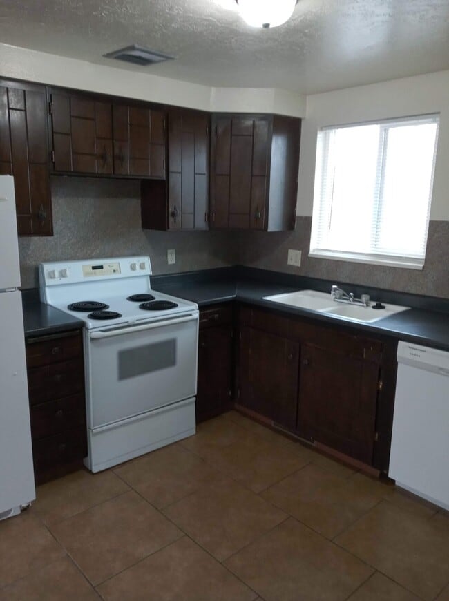 Building Photo - Roy 4-plex 1958