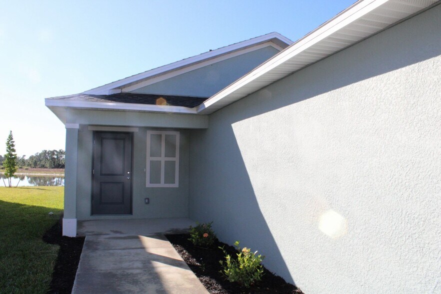 Building Photo - Brand New Construction in Lehigh Acres at Savanna Lakes MOVE IN SPECIAL FIRST MONTH RENT FREE!