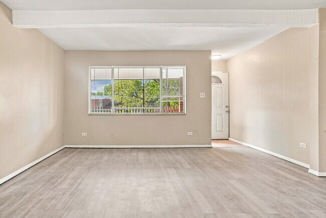 Building Photo - $1,645.95 with Half Off The First Month's Rent, 2 Beds - 1 Bath, Condo in Denver with Central A/C!