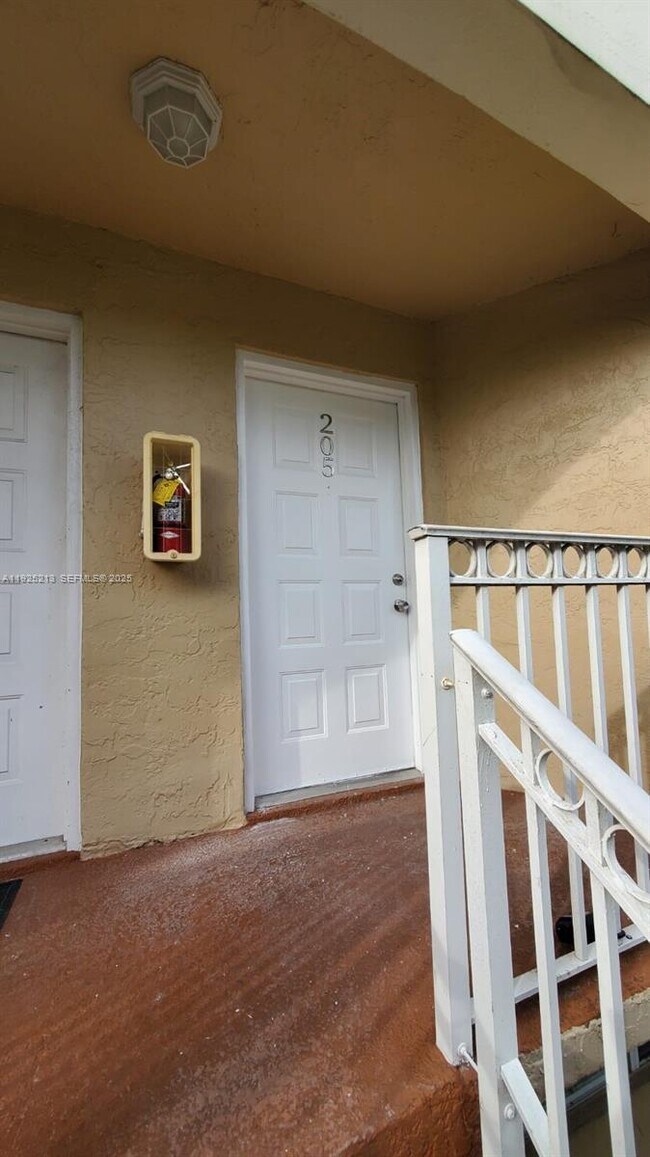 Building Photo - 8665 NW 6th Ln