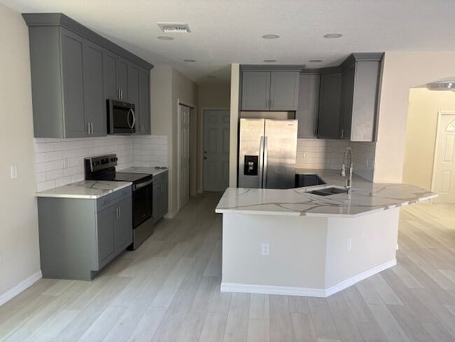 Building Photo - 4BR/3BA Two-Story Home in Hudson, FL – Move-In Ready