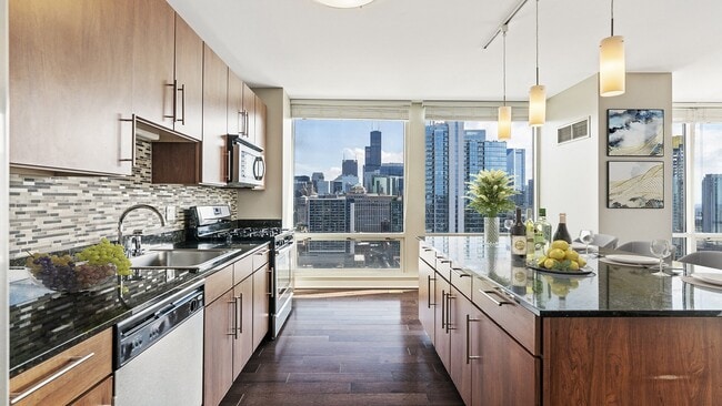 Indulge in our modern penthouse kitchens featuring luxury finishes and stunning views. - Flair Tower
