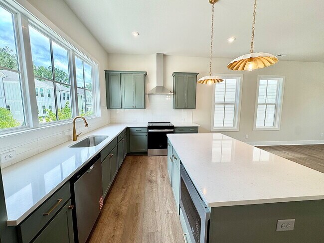Building Photo - Your Alpharetta Retreat Awaits – Elegant T...