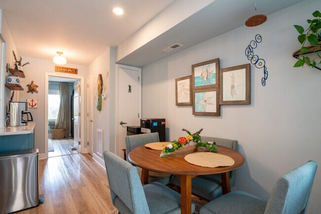 Building Photo - OFF-SEASON FURNISHED OASIS JUST STEPS FROM THE SAND