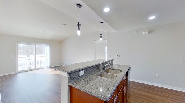 Building Photo - RENT SPECIAL -- Like New Condo Style Upper 3 Bedroom 2 Bathroom plus Den Apartment is Available