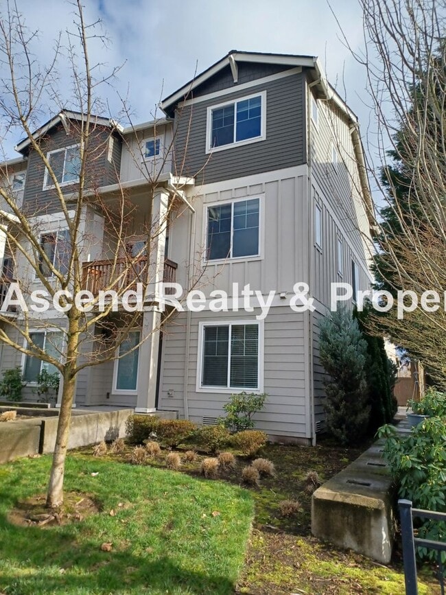 Building Photo - 3 Level End Unit Townhome with Newer Carpet, Open Floor Plan, 2 Balconies, 2 Car Attached Garage ...