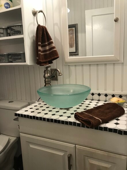 New ceramic tile vanity countertop with modern vessel sink and faucet - 1407 W Church St