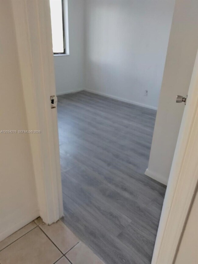Building Photo - 10886 Royal Palm Blvd