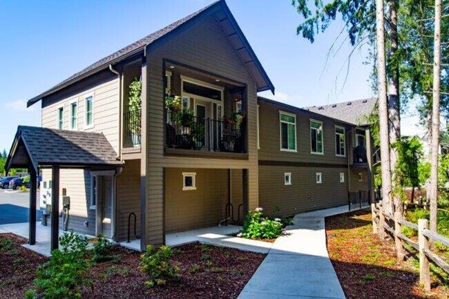 Building Photo - Come check out this 2 bedroom 2 bath with upscale interiors and open concept floorplan!