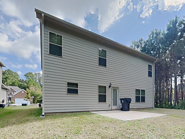 Building Photo - Now Leasing! Your New Home Awaits! 4BR Bea...