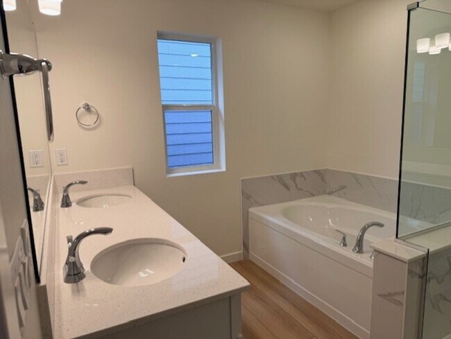 Building Photo - Elegant 4-Bed, 4-Bath 3-Story Home with Gourmet Kitchen & Private Backyard