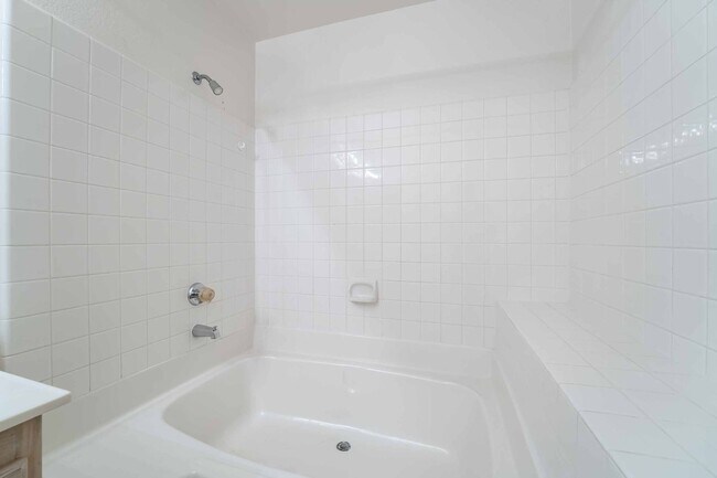 Building Photo - Charming First-Floor Home with Open Living and Private Patio