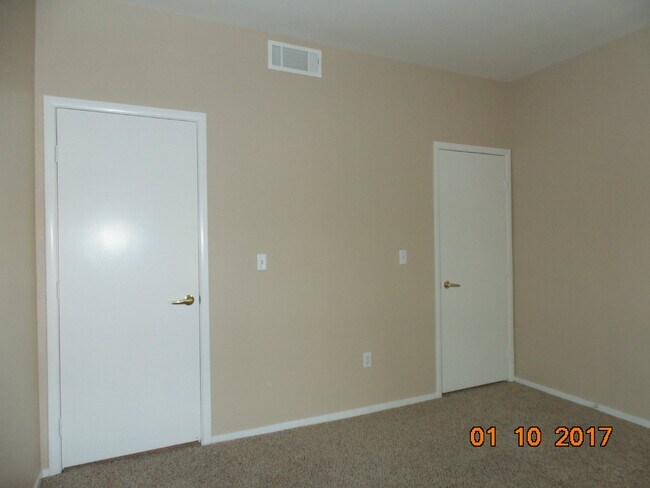 Building Photo - COZY 2 BEDROOM 2 FULL BATH CONDO LOCATED ON SECOND LEVEL
