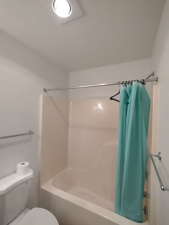 Building Photo - 3 BR, 2 BA unit in QUITE 4 plex. Storage & W/D included