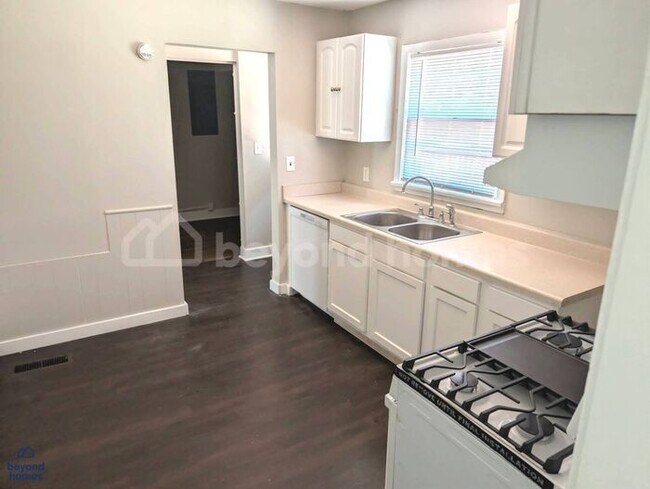 Building Photo - Updated Bungalow with Massive Deck and Fully Fenced Yard!