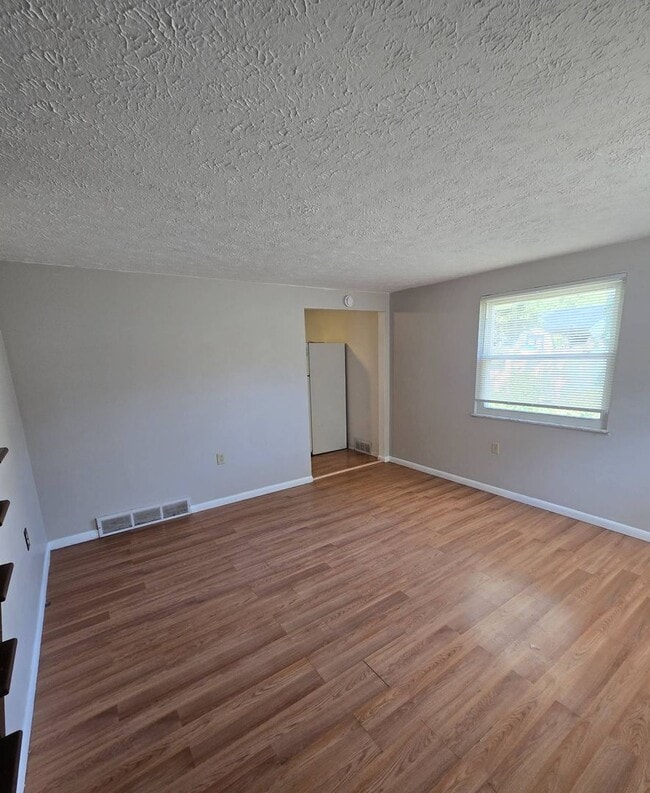 Building Photo - 5085-5085 Quincy St NW