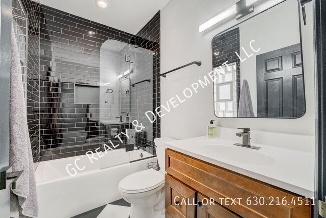 Building Photo - *** FULLY RENOVATED / FREE 87-IN TV INCLUD...