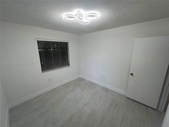 Building Photo - 9501 E Calusa Club Dr