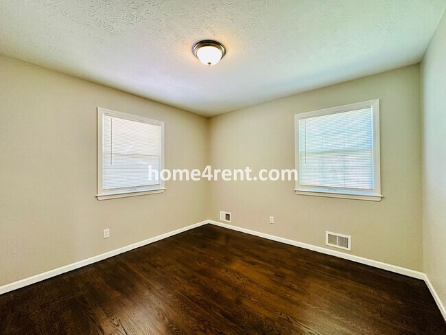 Building Photo - Like New, Ranch Style Home in Raytown - Wood Floors, Finished Basement, Fenced Yard!