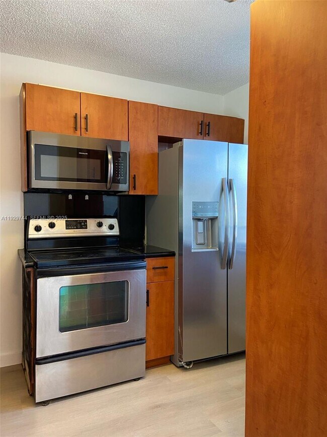 Building Photo - 8740 N Sherman Cir