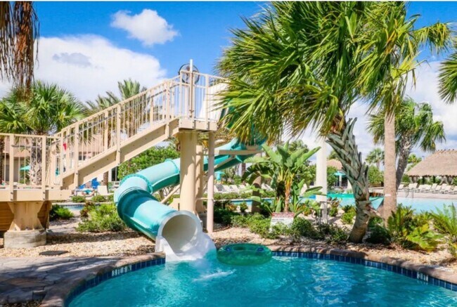 Building Photo - BEAUTIFUL CHAMPIONS GATE 2 BED 2 BATH COND0  w/GARAGE - FULLY FURNISHED - 12 MONTH RENTAL