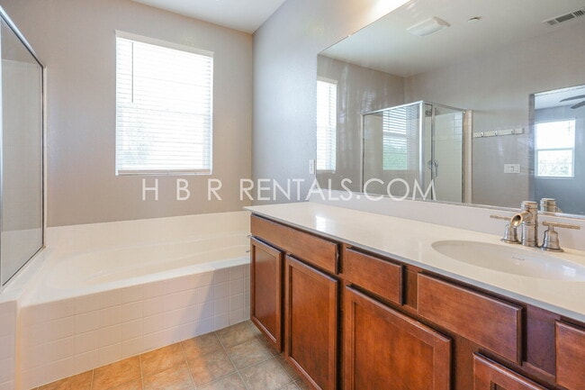 Building Photo - Questa Village: Spacious 3-Bedroom Retreat...