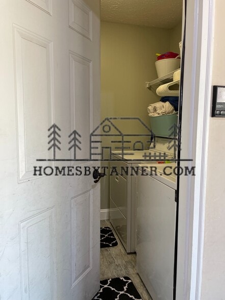 Entry from 2 car garage / Laundry (upstairs, w/d included) - 481 Yenowine Ln