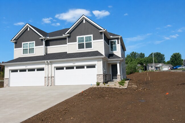 Building Photo - Brand New Construction - Pristine, Bright NW Townhome!