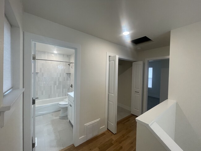 Bathroom and laundry room - 227 N El Paso St