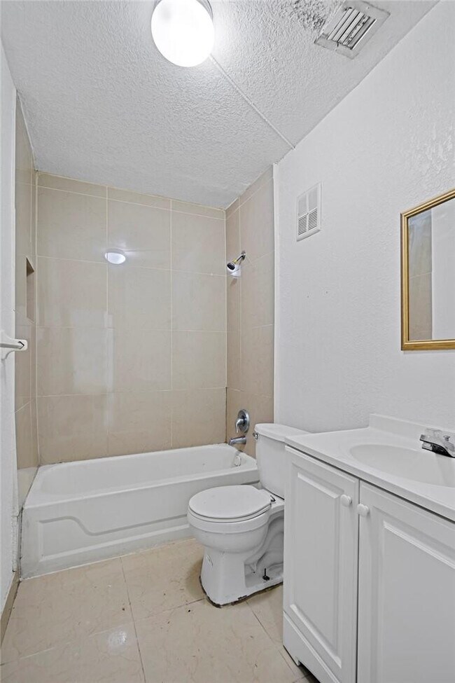 Building Photo - 3100 Coral Springs Dr