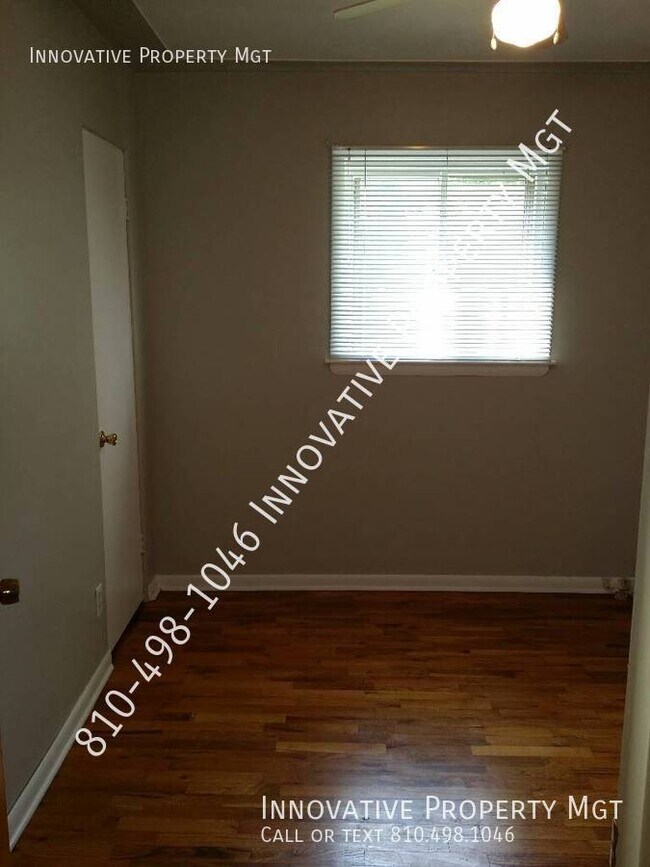 Building Photo - Spacious 4 bedroom , 1 1/2 bath home in Ga...