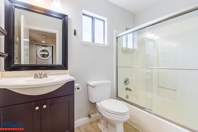 Building Photo - Lovely Condo | Garage | A/C | In-Unit Laundry