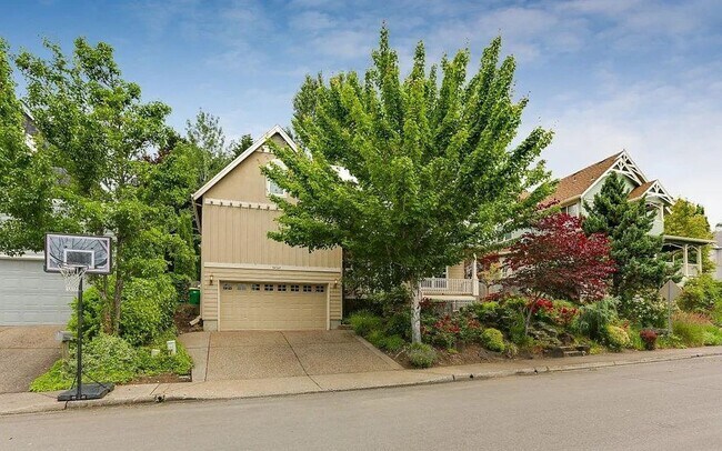 Building Photo - Spacious Four-Bedroom Home with Gourmet Kitchen, Multiple Living Areas, Loft, and Beautifully Lan...