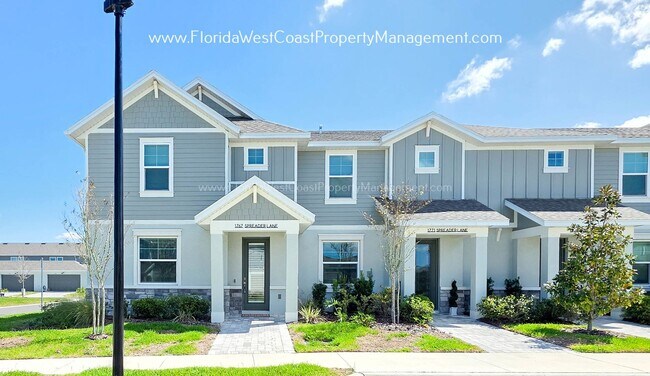 Building Photo - EXCEPTIONAL AND SPACIOUS FURNISHED TOWNHOME WITHIN WATERSIDE- NAUTIQUE!