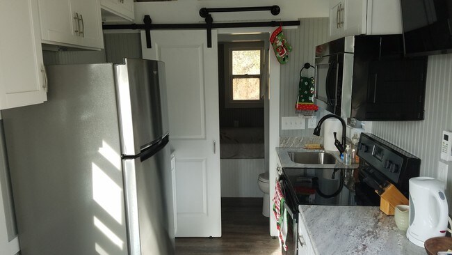 Full sized kitchen door to bathroom and bedro - 1294 Glendale Ave