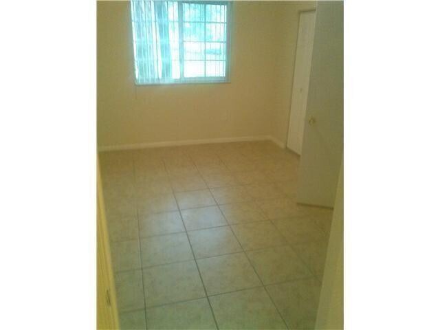Building Photo - 3241 Sabal Palm Manor