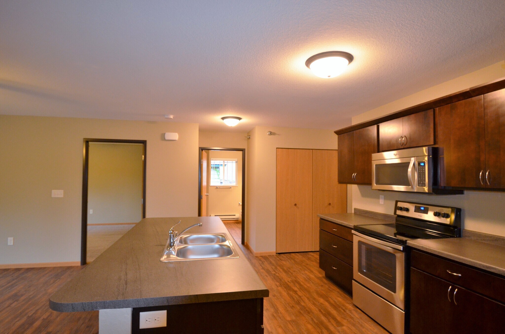 Kitchen w/ Stainless Steel Appliances - 420 11th St N