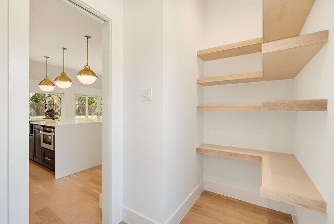 Building Photo - Modern Preston Hollow-Area Home with Resort-Style Services