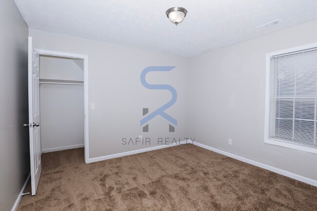 Building Photo - Move in before January 31st and choose your reward: a $250 Amazon Gift Card or a 55" Smart TV!