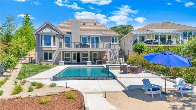 Building Photo - Luxury Lakefront Retreat with Pool, Hot Tub & Private Dock on Lake Tulloch - Recently Remodeled!