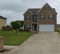 Building Photo - 4 bedroom 2 and 1 half bath 2 story home i...
