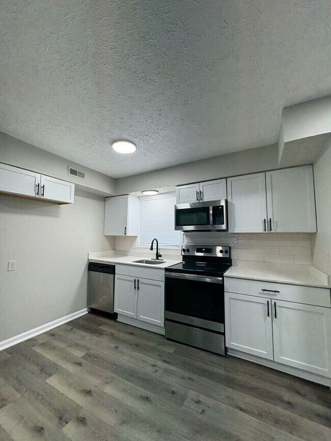 Building Photo - Welcome Home to Garfield Place Living: Where Comfort Meets Convenience